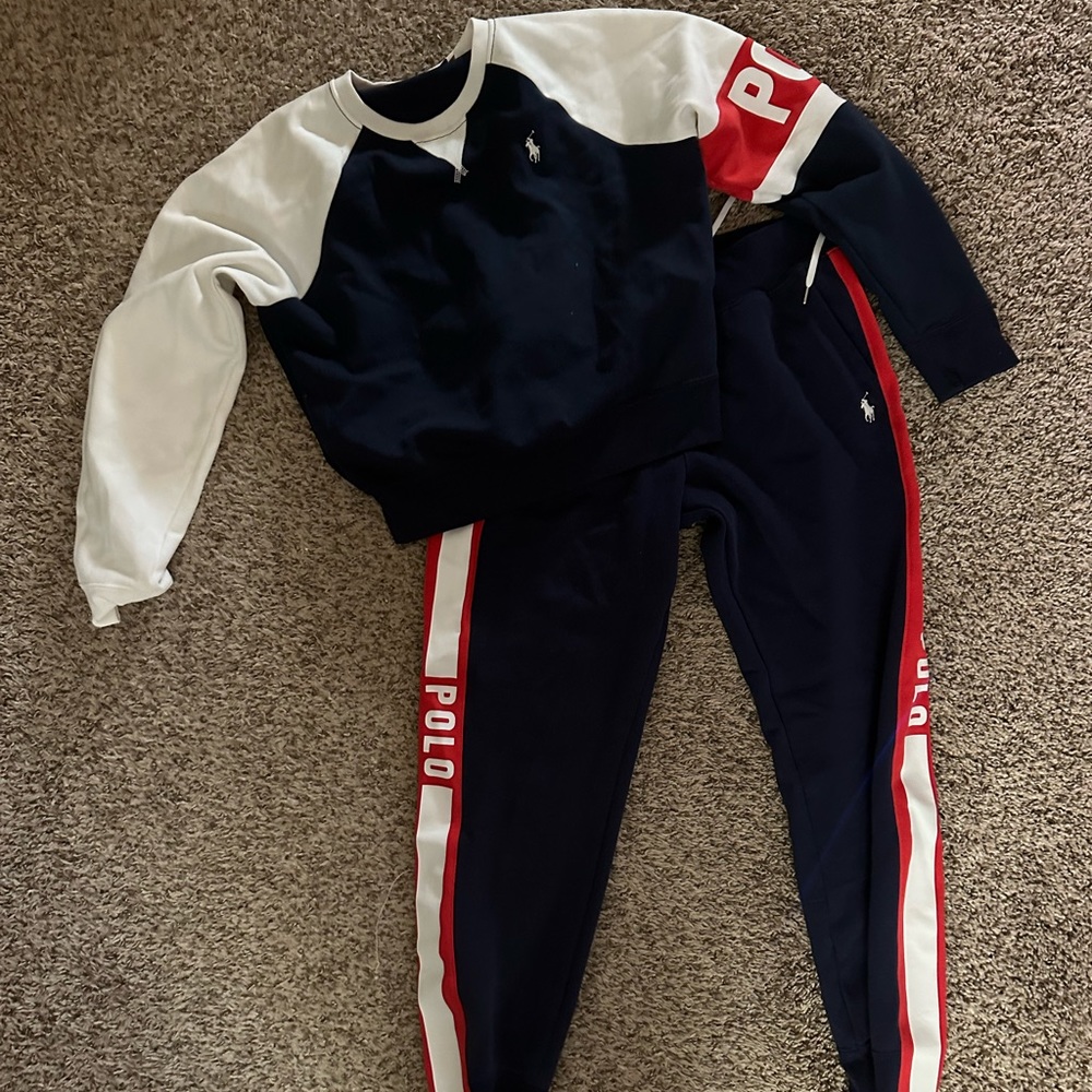 Women’s size medium Ralph Lauren Polo set. Navy blue, red and white. Worn once.